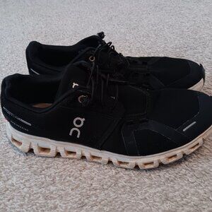 On Clouds womans running shoes size 9